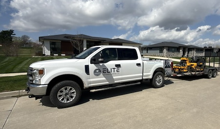 Elite outdoor services truck and mower